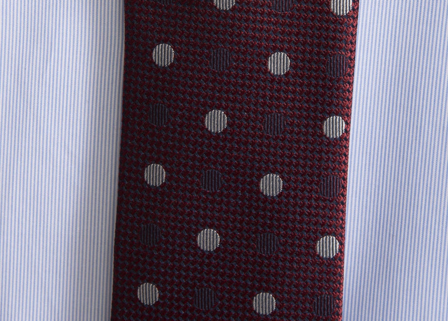 Cravatta microfantasia rossa con pois argento